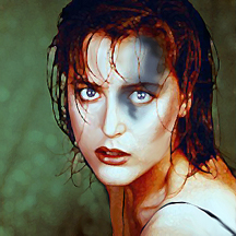 Twisting to look over her shoulder, she discovered two men standing about an arms length away, blocking her access to her gun.