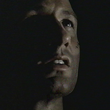 Mulder sat at the mouth of the cave, elbows propped on his knees, eyes aimed at the stars.